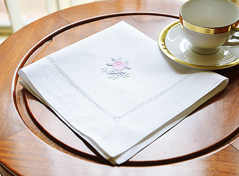 Fancy Rose Embroidered Napkin. Wide Hemstitch. 18" napkin.